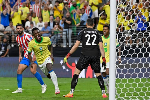 Vinicius Junior celebrates scoring a goal against Paraguay